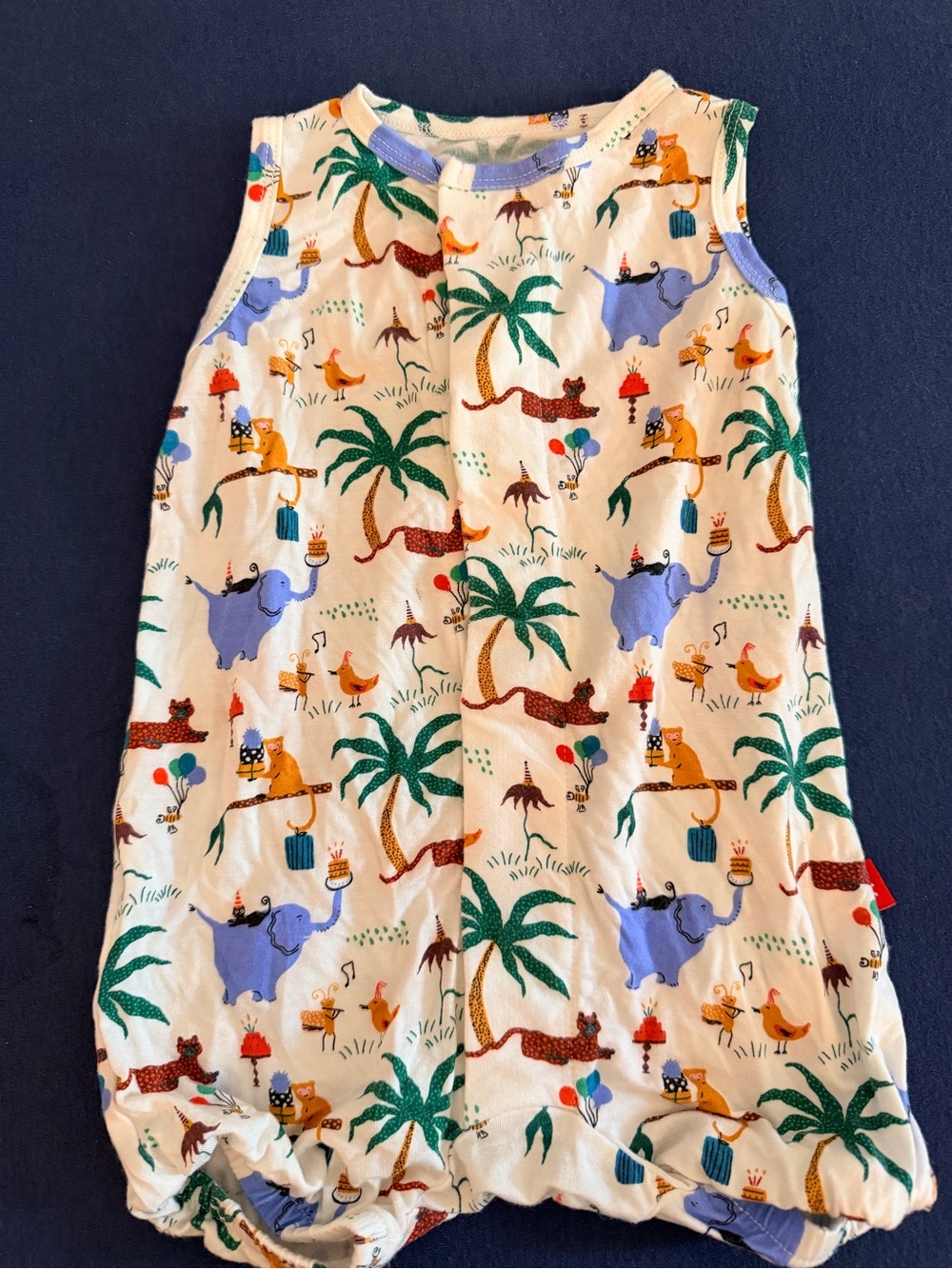 Magnetic Me Cream One-Piece with Green, Blue and Orange Animal Print